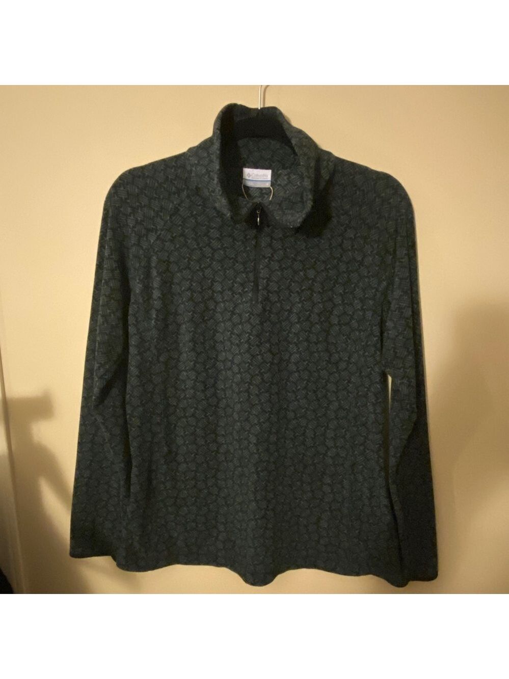 Columbia soft fleece. Patterned on grey.
